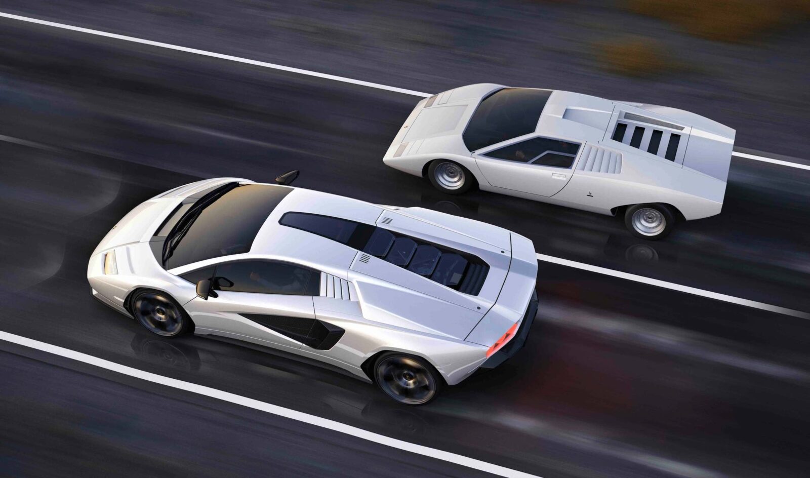 Lamborghini Countach driving next to the original model